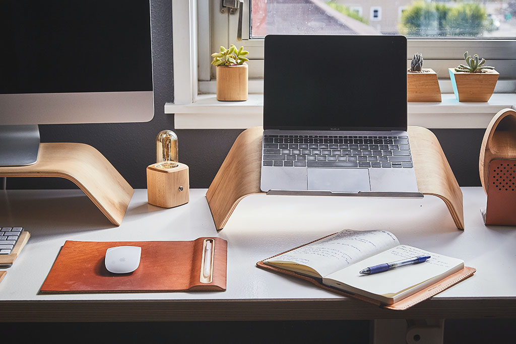 Organized and organized desk space where someone could focus and read fast without distractions.